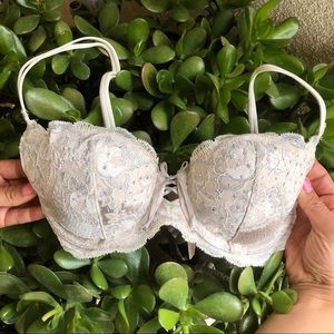 Victoria’s Secret white rhinestone and lace bra